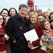 Security is called for One Direction fans trying to see their idols at The Fitzwilliam Hotel. Meanwhile at The O2, Liam Payne's parents Geoff & Karen Payne pose with One Direction fans queuing ahead of tonight's gig, Dublin, Ireland - 24.01.12. Pictures: VIPIRELAND.COM